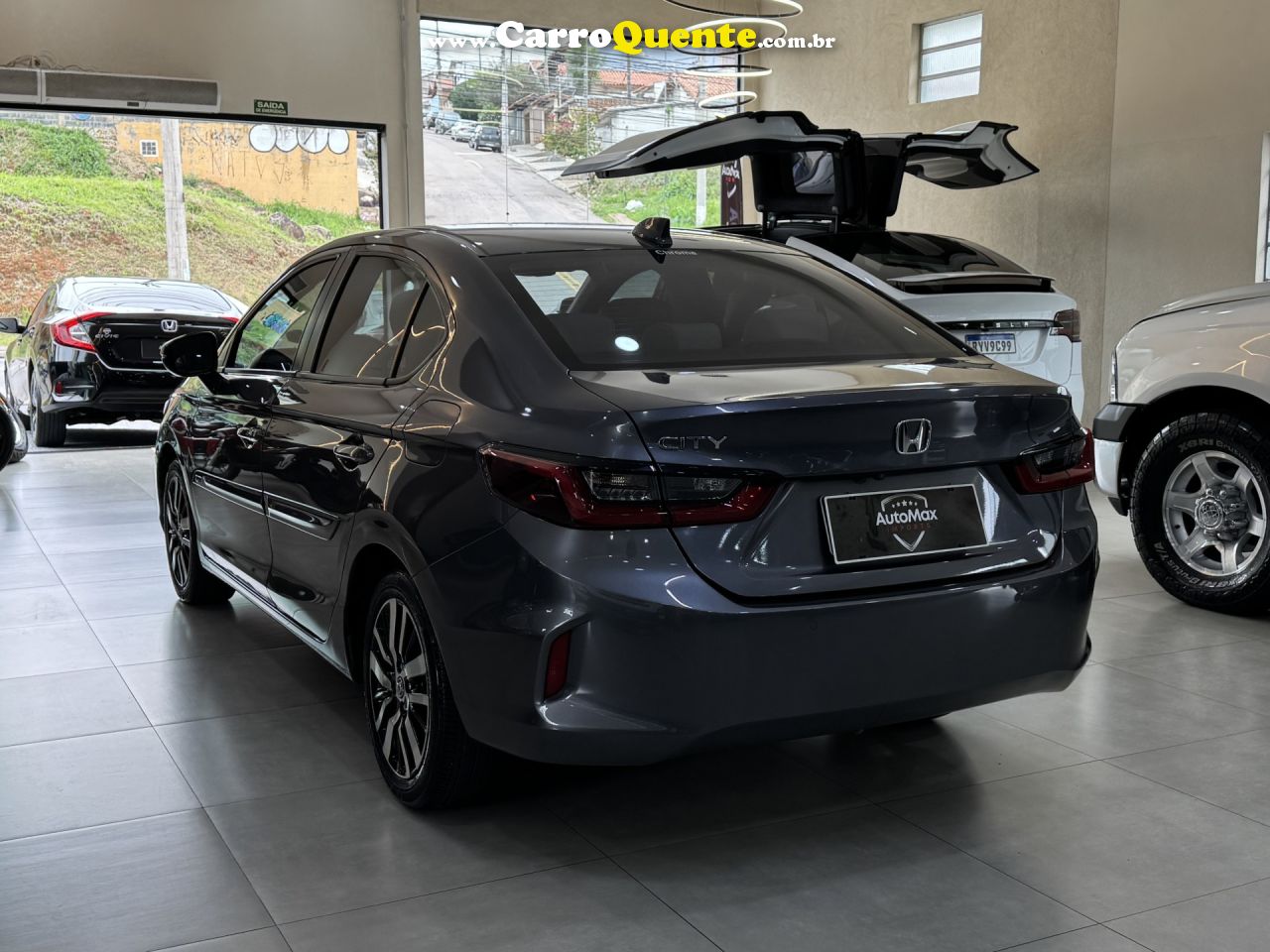 HONDA   CITY SEDAN TOURING 1.5 FLEX 16V 4P AUT.   CINZA 2022 1.5 FLEX - Loja