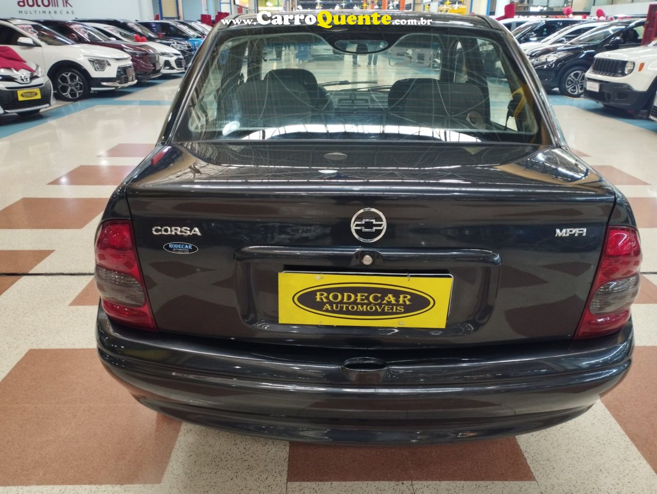 CHEVROLET CORSA 1.0 MPFI MILENIUM SEDAN 8V 2002 - Loja