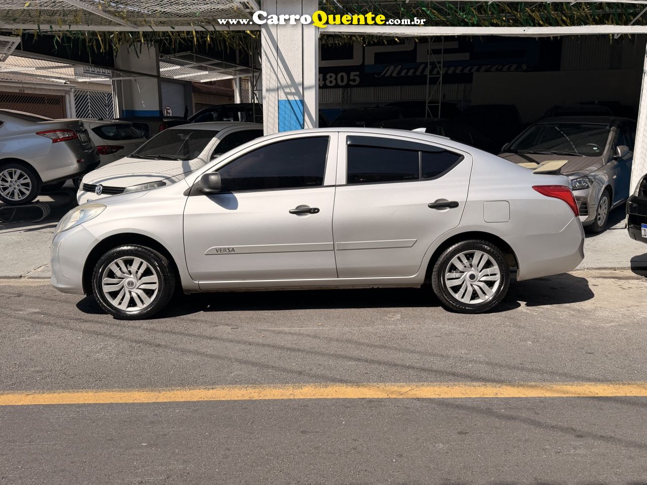 NISSAN   VERSA S 1.6 16V FLEX FUEL 4P MEC.   PRATA 2013 1.6 FLEX - Loja
