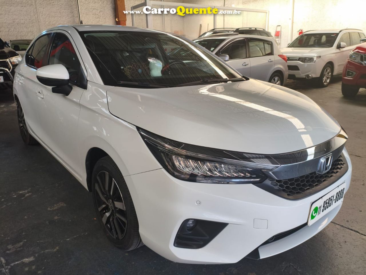 HONDA   CITY HATCHBACK TOURING 1.5 FLEX 16V AUT   BRANCO 2023 1.5 FLEX - Loja