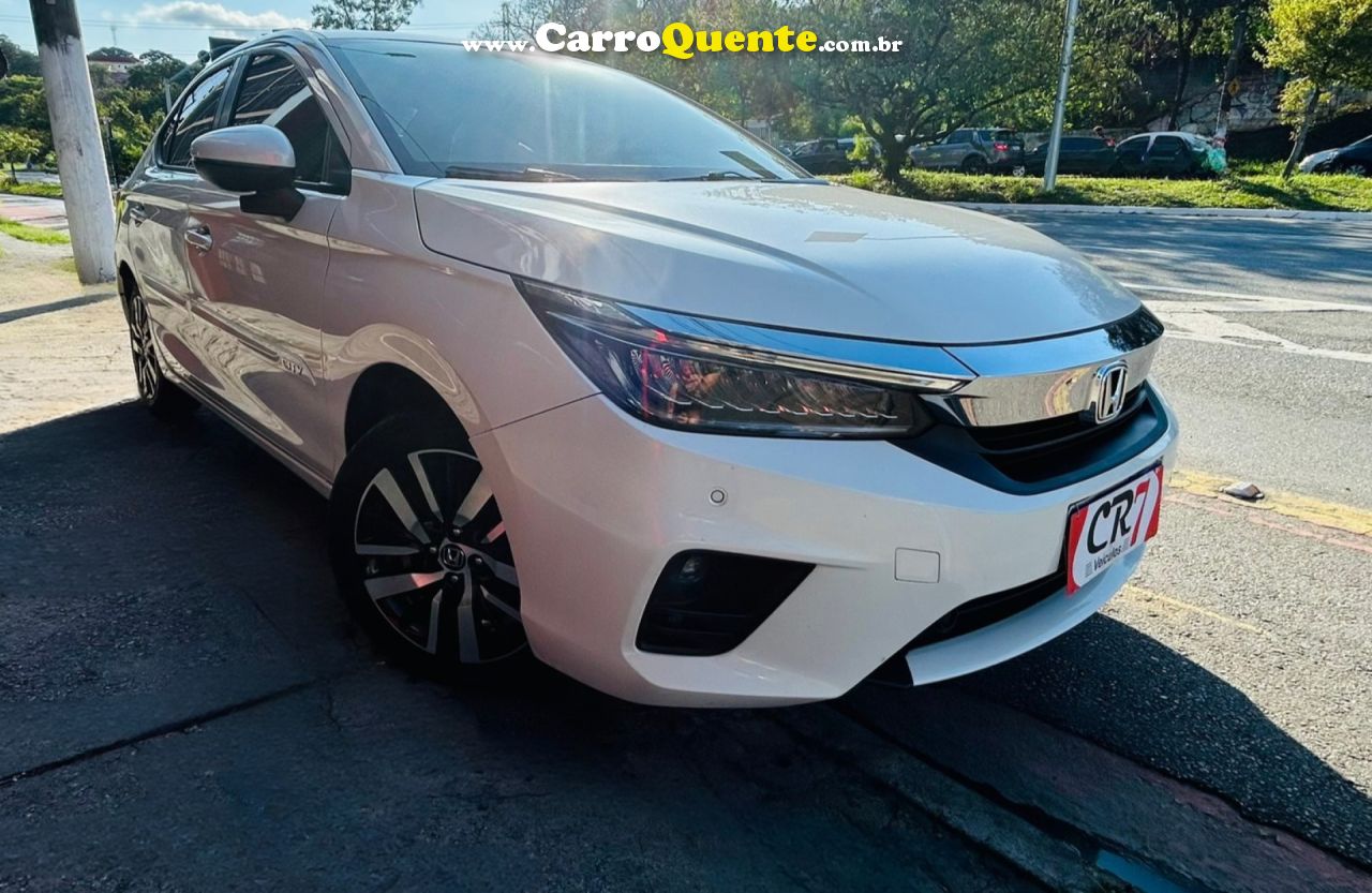 HONDA   CITY SEDAN TOURING 1.5 FLEX 16V 4P AUT.   BRANCO 2023 1.5 FLEX - Loja
