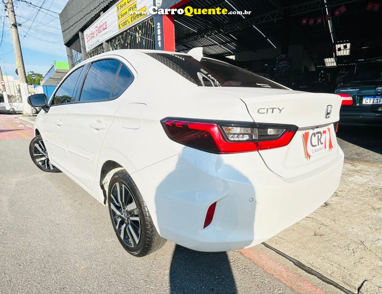 HONDA   CITY SEDAN TOURING 1.5 FLEX 16V 4P AUT.   BRANCO 2023 1.5 FLEX - Loja