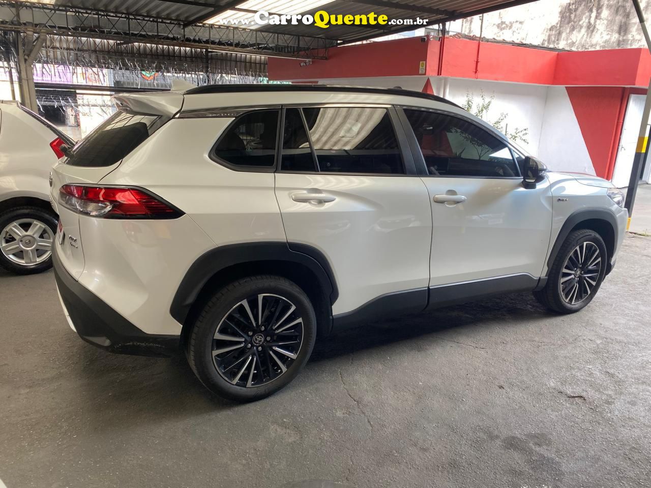 TOYOTA   COROLLA CROSS XRX 1.8 16V AUT.(HYBRID)   BRANCO 2025 1.8 FLEX E ELÉTRICO - Loja