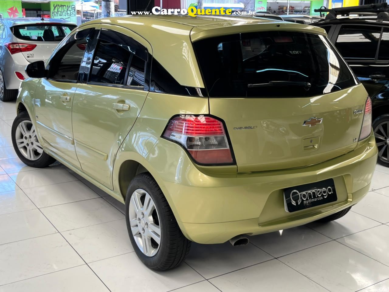 CHEVROLET   AGILE LTZ 1.4 MPFI 8V FLEXPOWER 5P   AMARELO 2010 1.4 FLEX - Loja