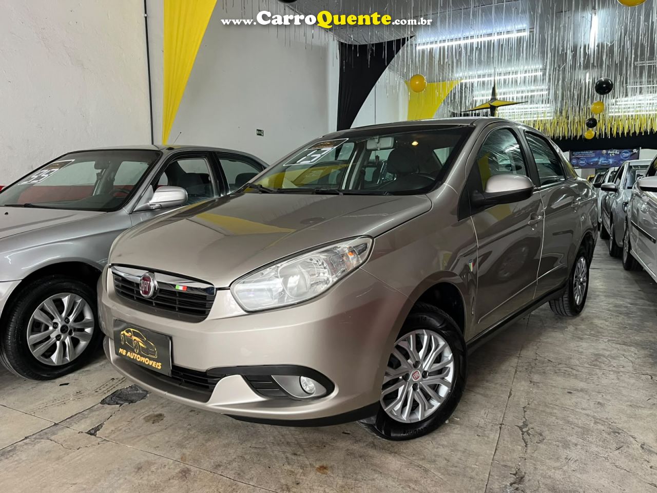 FIAT   GRAND SIENA ATTRAC. 1.4 EVO F.FLEX 8V   DOURADO 2013 1.4 GASOLINA - Loja