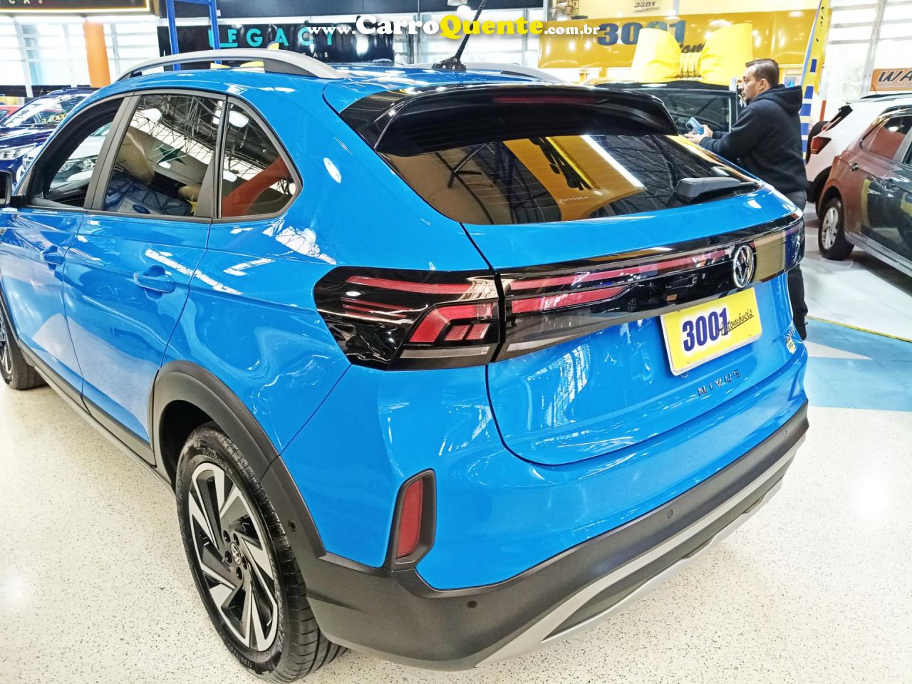 VOLKSWAGEN NIVUS 1.0 200 TSI TOTAL HIGHLINE 2025 - Loja