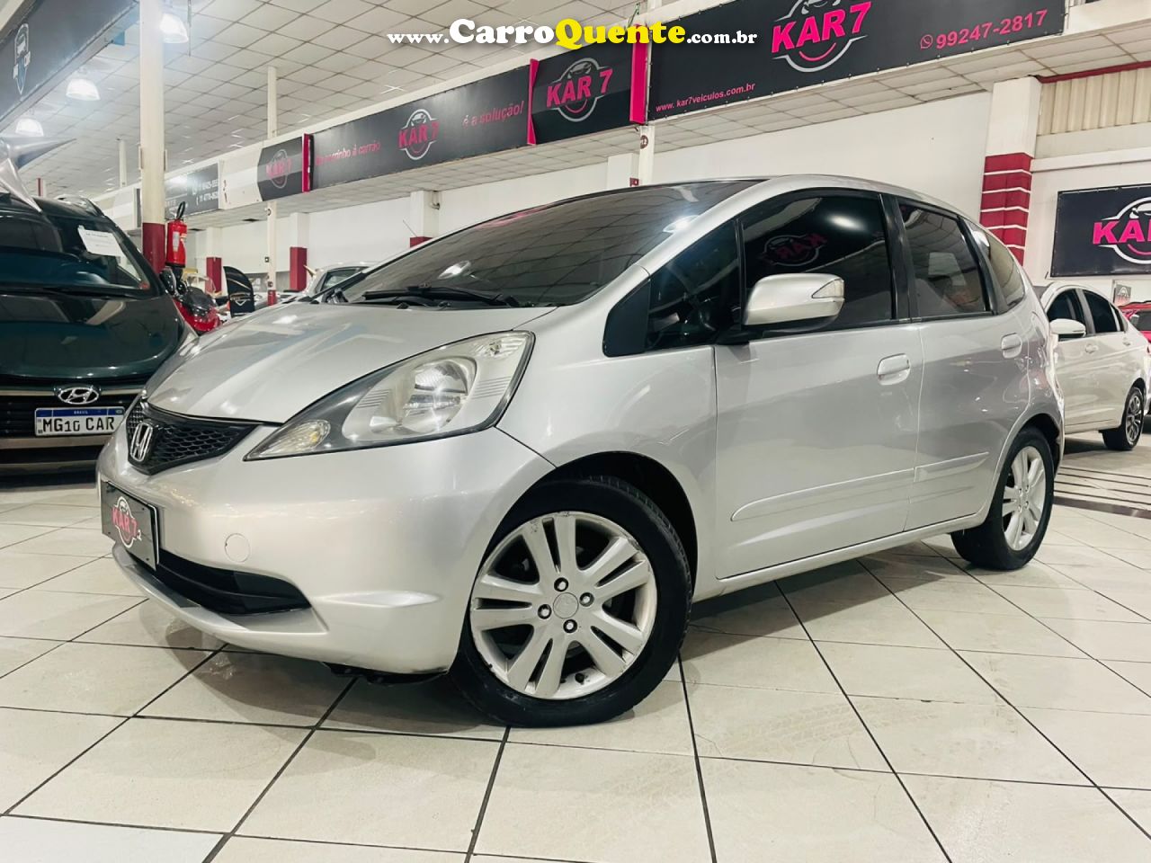 HONDA   FIT EXSEX 1.5 FLEXFLEXONE 16V 5P AUT.   PRATA 2009 1.5 GASOLINA - Loja
