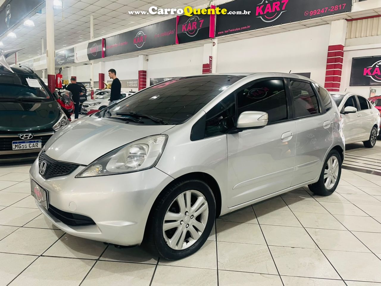 HONDA   FIT EXSEX 1.5 FLEXFLEXONE 16V 5P AUT.   PRATA 2009 1.5 GASOLINA - Loja