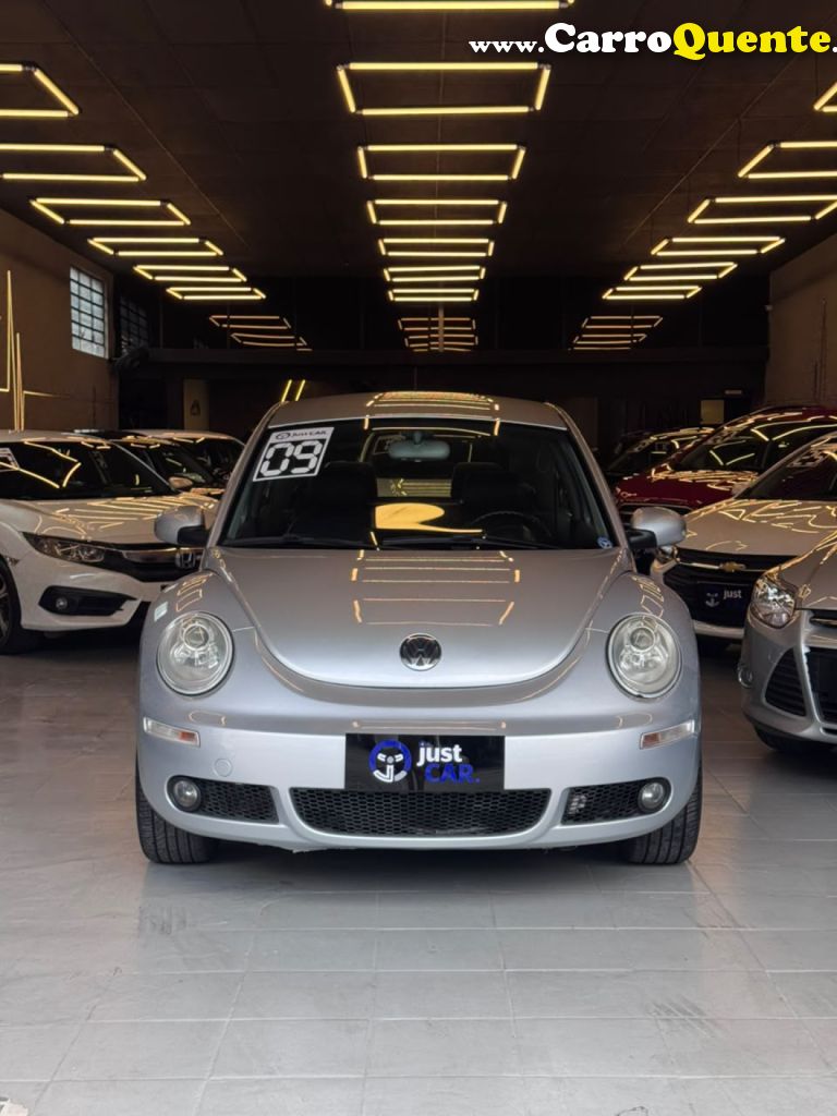 VOLKSWAGEN   NEW BEETLE 2.0 MI MEC.AUT.   PRATA 2009 2.0 GASOLINA - Loja