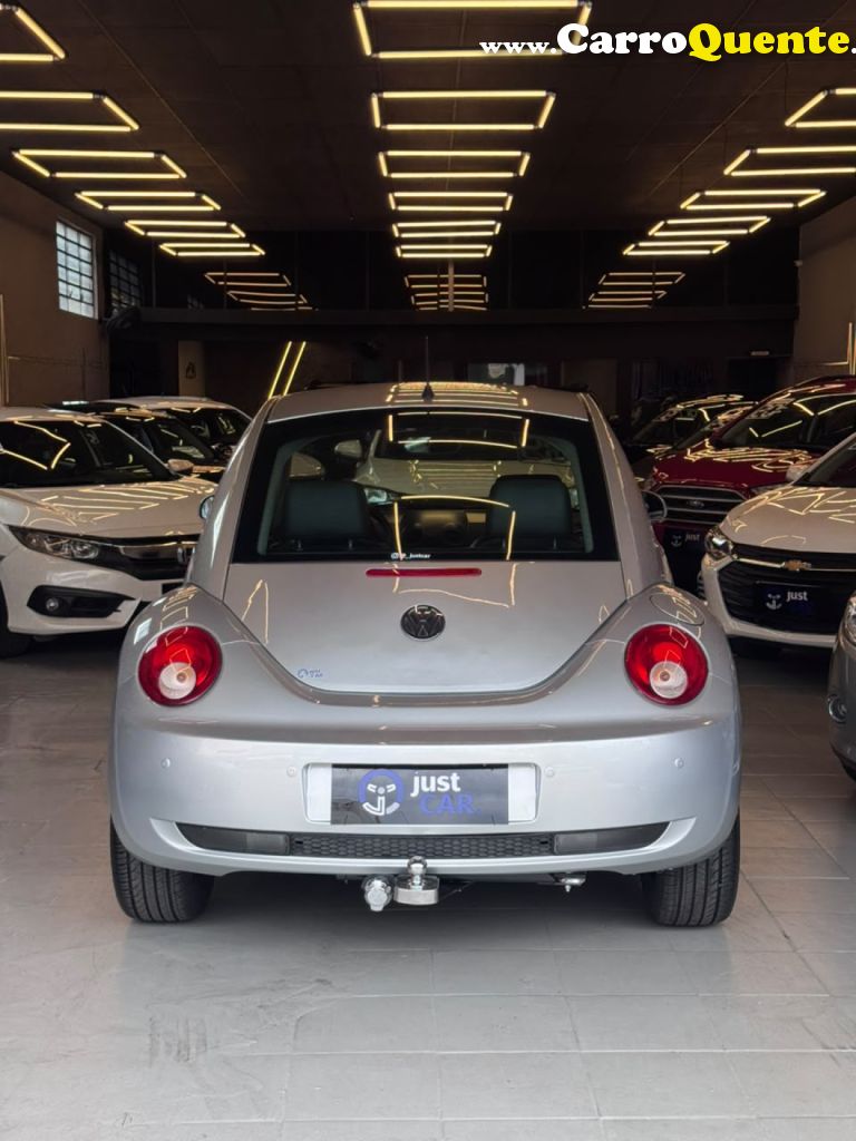 VOLKSWAGEN   NEW BEETLE 2.0 MI MEC.AUT.   PRATA 2009 2.0 GASOLINA - Loja