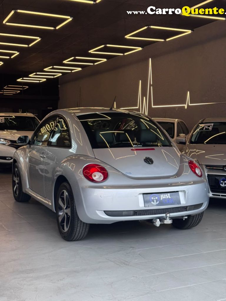 VOLKSWAGEN   NEW BEETLE 2.0 MI MEC.AUT.   PRATA 2009 2.0 GASOLINA - Loja