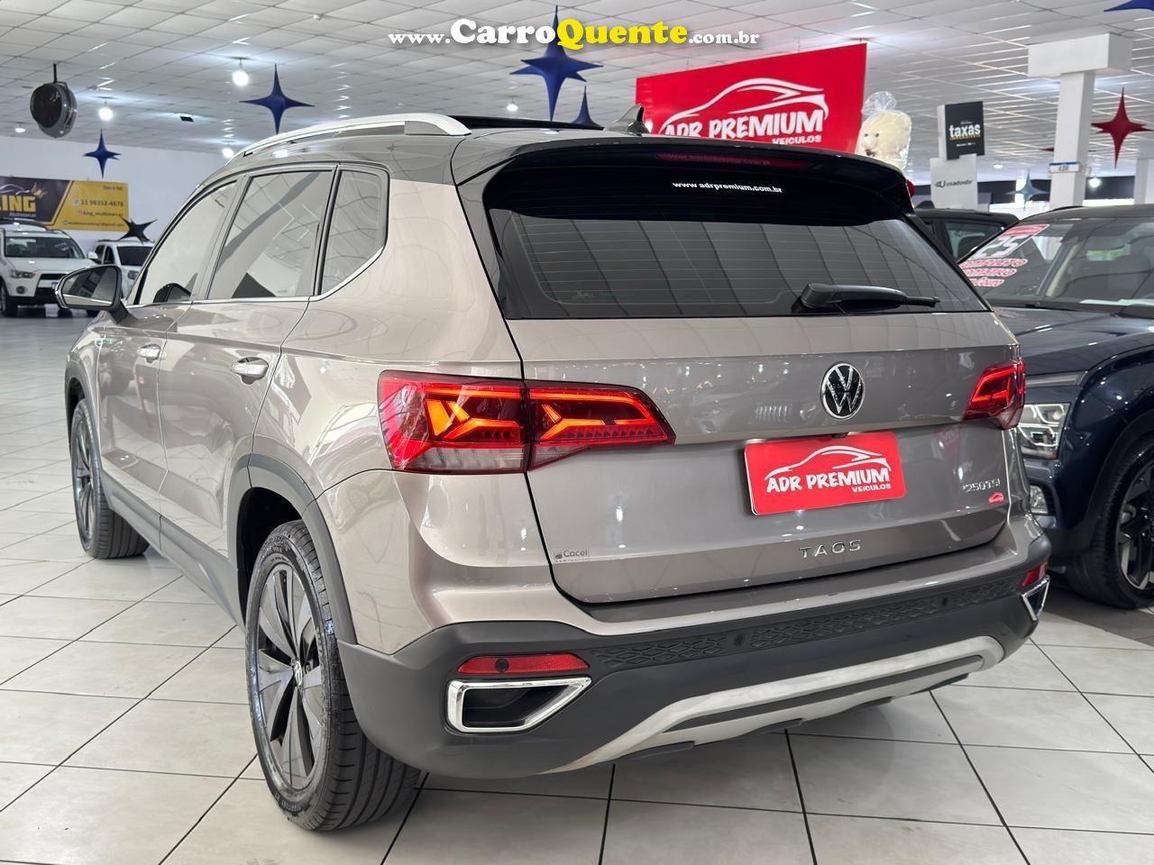 VOLKSWAGEN TAOS 250 TSI HIGHLINE 2022 - Loja
