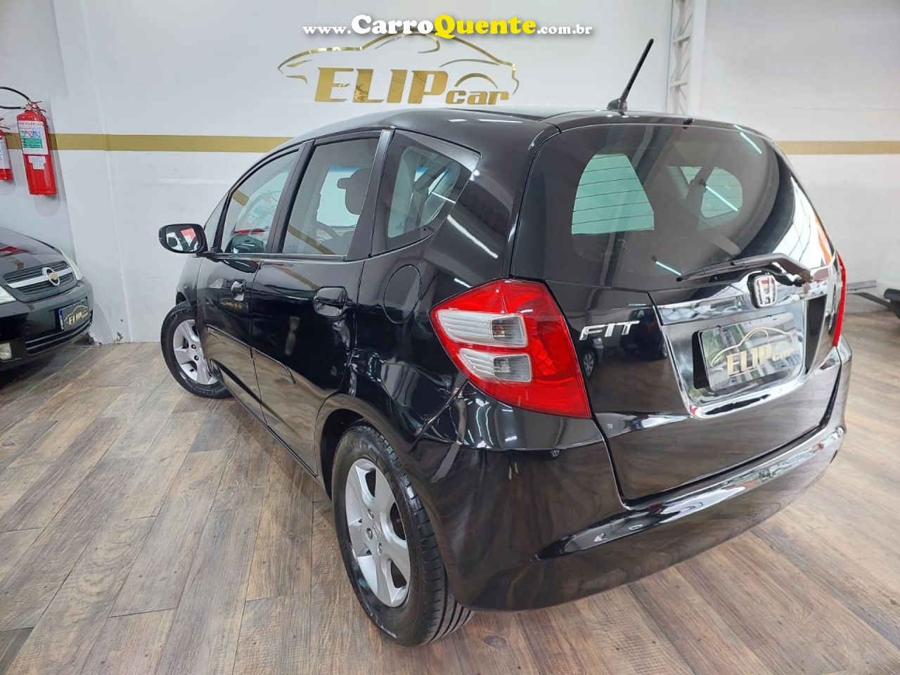 HONDA   FIT LXL 1.4 1.4 FLEX 8V16V 5P MEC.   PRETO 2009 1.4 FLEX - Loja