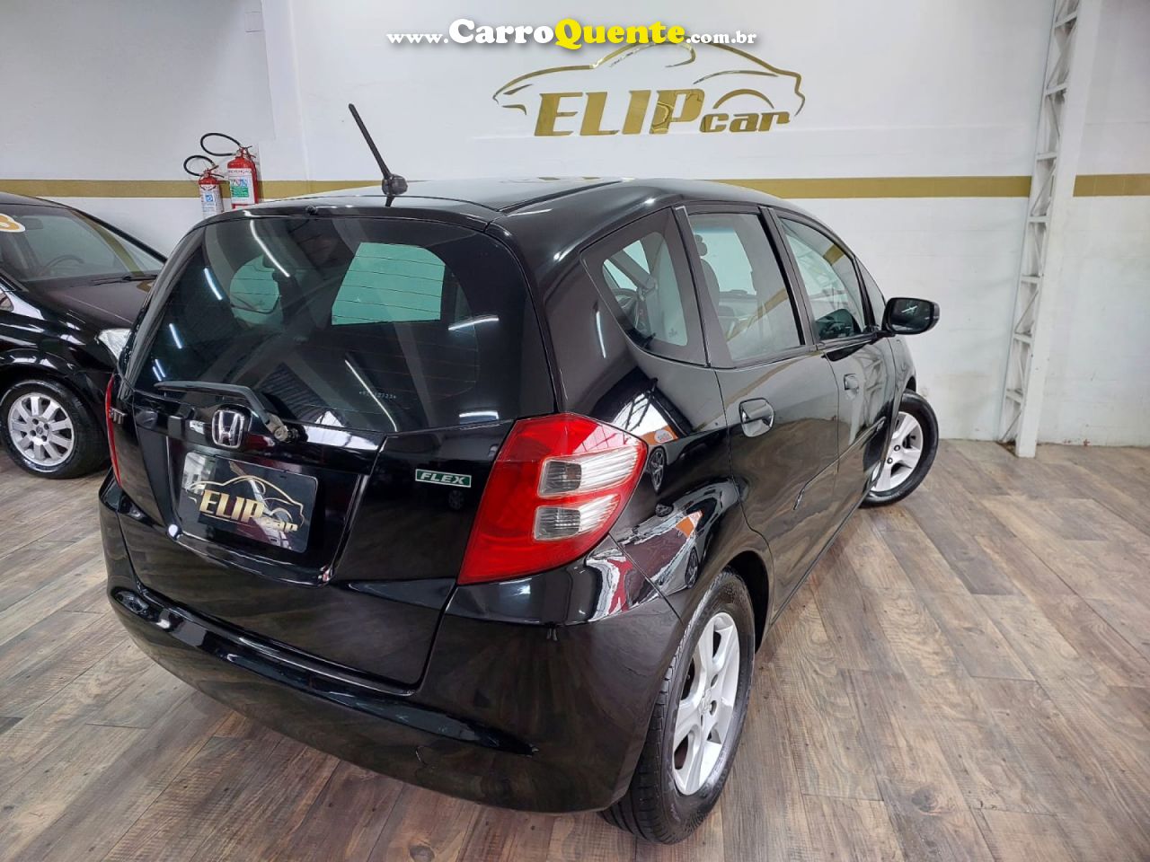 HONDA   FIT LXL 1.4 1.4 FLEX 8V16V 5P MEC.   PRETO 2009 1.4 FLEX - Loja