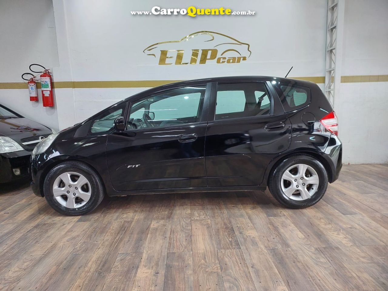 HONDA   FIT LXL 1.4 1.4 FLEX 8V16V 5P MEC.   PRETO 2009 1.4 FLEX - Loja