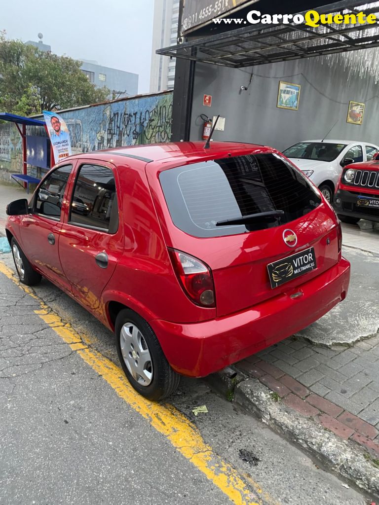 CHEVROLET   CELTA SPIRIT LT 1.0 MPFI 8V FLEXP. 5P   VERMELHO 2010 1.0 FLEX - Loja