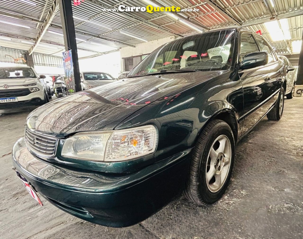 TOYOTA   COROLLA XEI 1.81.8 FLEX 16V AUT.   VERDE 2000 1.8 GASOLINA - Loja