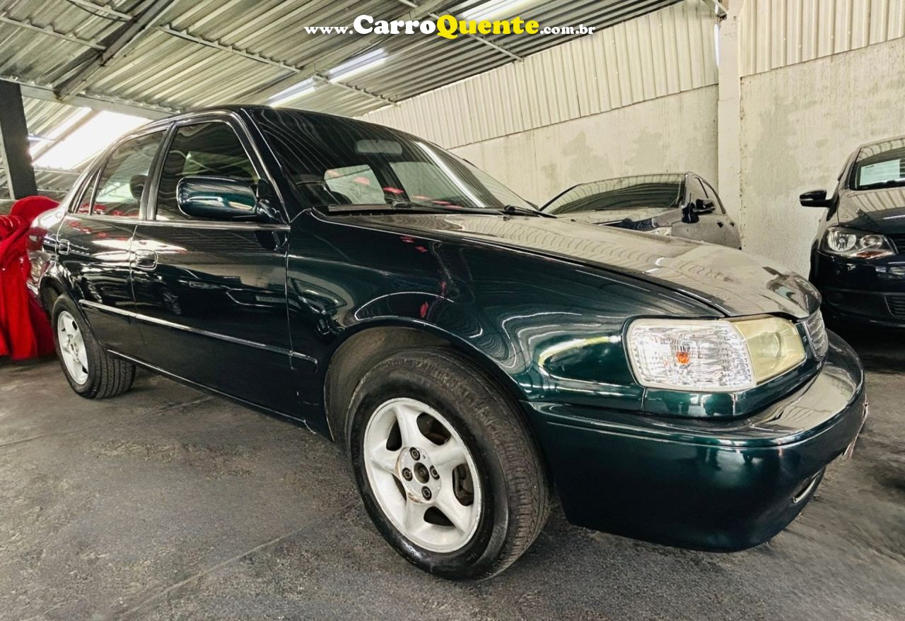 TOYOTA   COROLLA XEI 1.81.8 FLEX 16V AUT.   VERDE 2000 1.8 GASOLINA - Loja