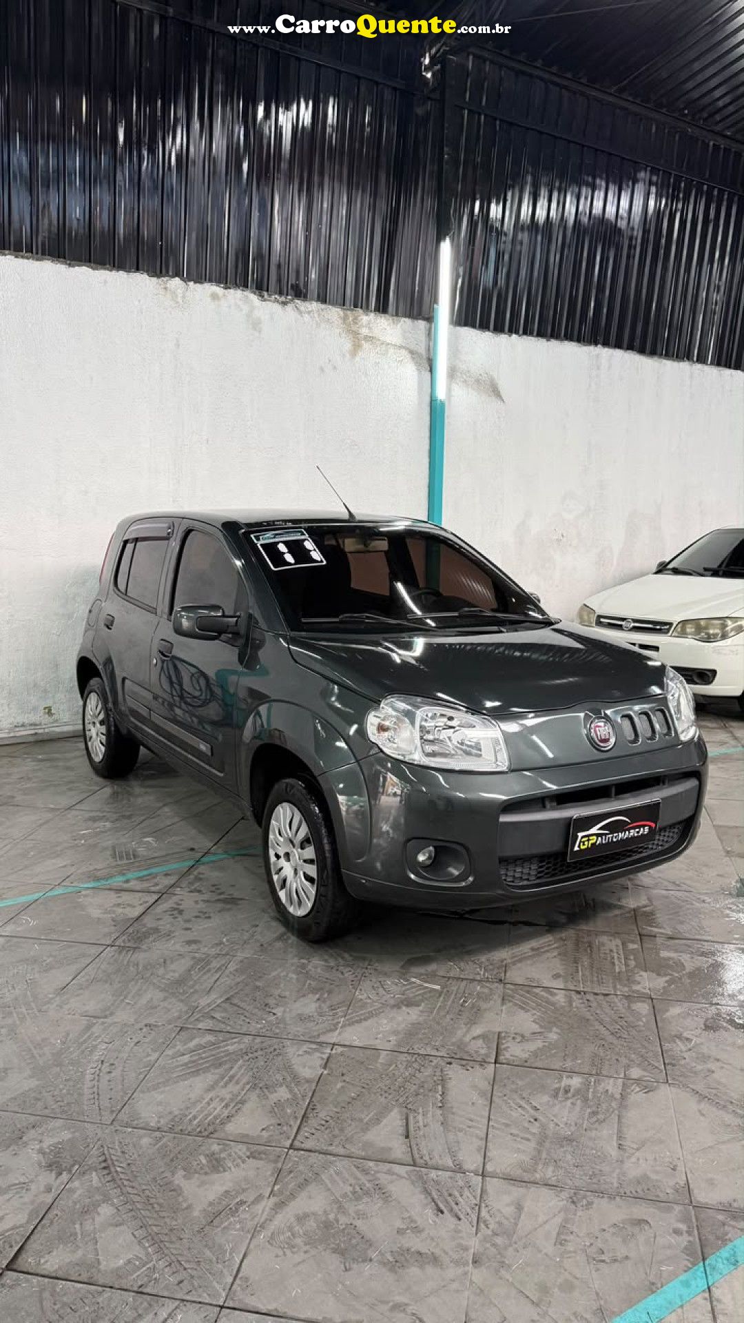 FIAT   UNO VIVACE CELEB. 1.0 EVO F.FLEX 8V 5P   CINZA 2011 1.0 GASOLINA - Loja
