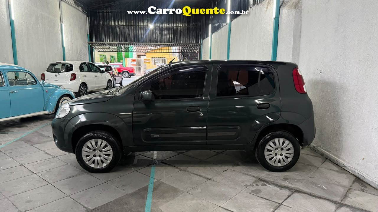 FIAT   UNO VIVACE CELEB. 1.0 EVO F.FLEX 8V 5P   CINZA 2011 1.0 GASOLINA - Loja