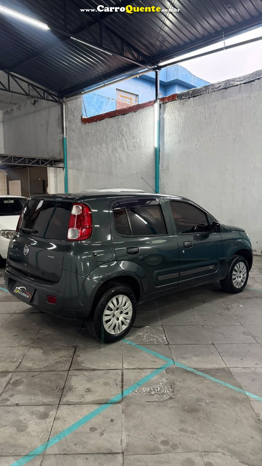 FIAT   UNO VIVACE CELEB. 1.0 EVO F.FLEX 8V 5P   CINZA 2011 1.0 GASOLINA - Loja