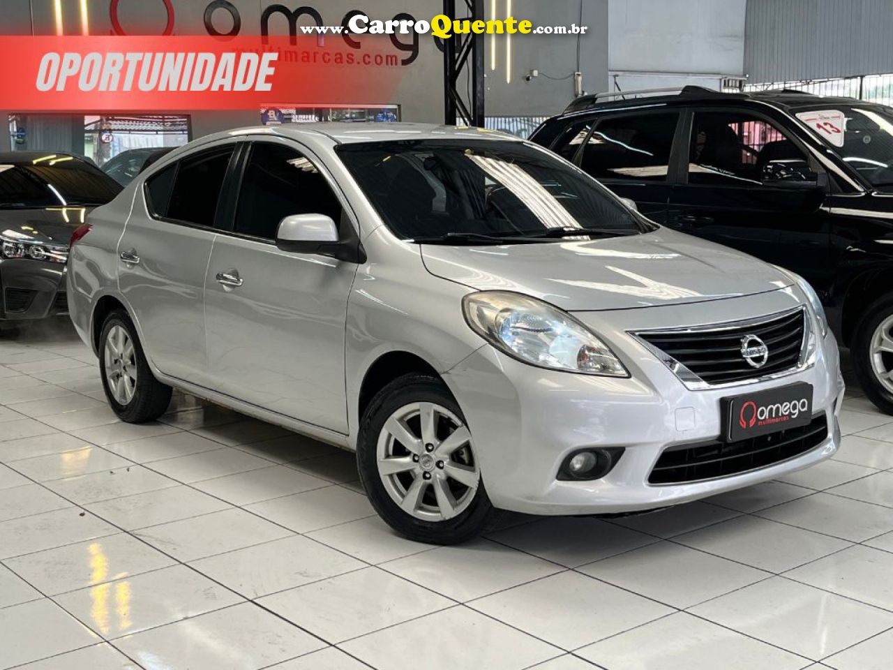 NISSAN   VERSA SL 1.6 16V FLEX FUEL 4P MEC.   PRATA 2013 1.6 FLEX - Loja