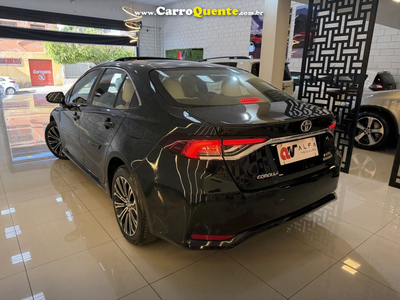 TOYOTA   COROLLA ALTIS PREM. HYBRID 1.8 AUT   PRETO 2021 1.8 GASOLINA - Loja