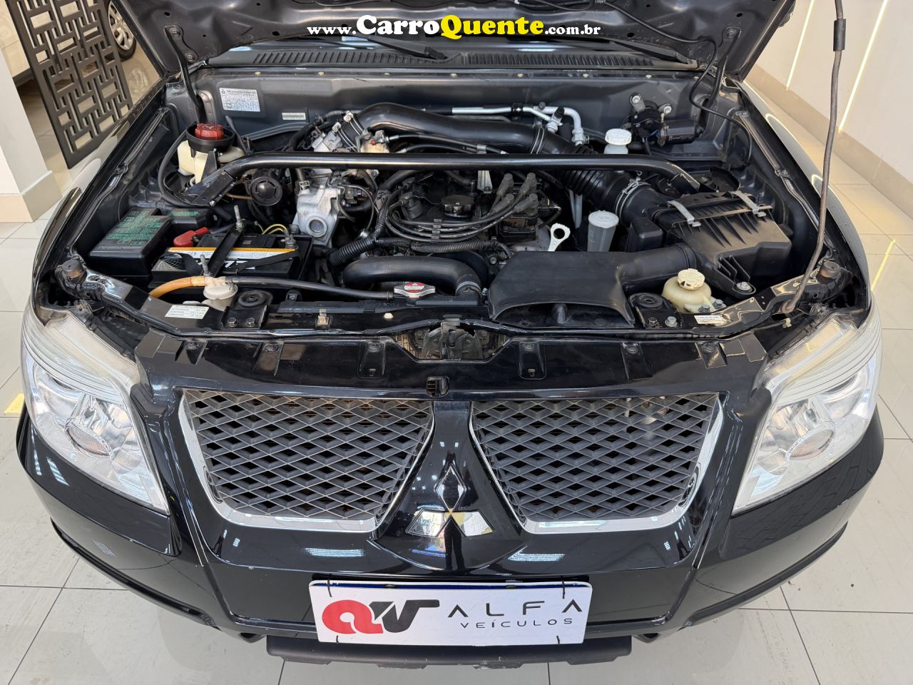 MITSUBISHI   PAJERO TR4 2.0 2.0 FLEX 16V 4X4 AUT.   PRETO 2015 2.0 FLEX - Loja