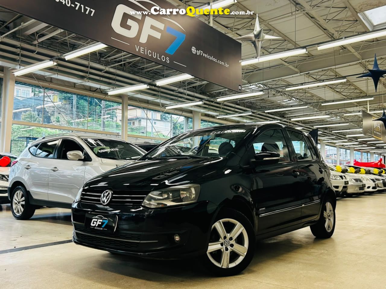 VOLKSWAGEN   FOX PRIMEHGHI. IMOTION 1.6 T.FLEX 8V 5P   PRETO 2011 1.6 GASOLINA - Loja