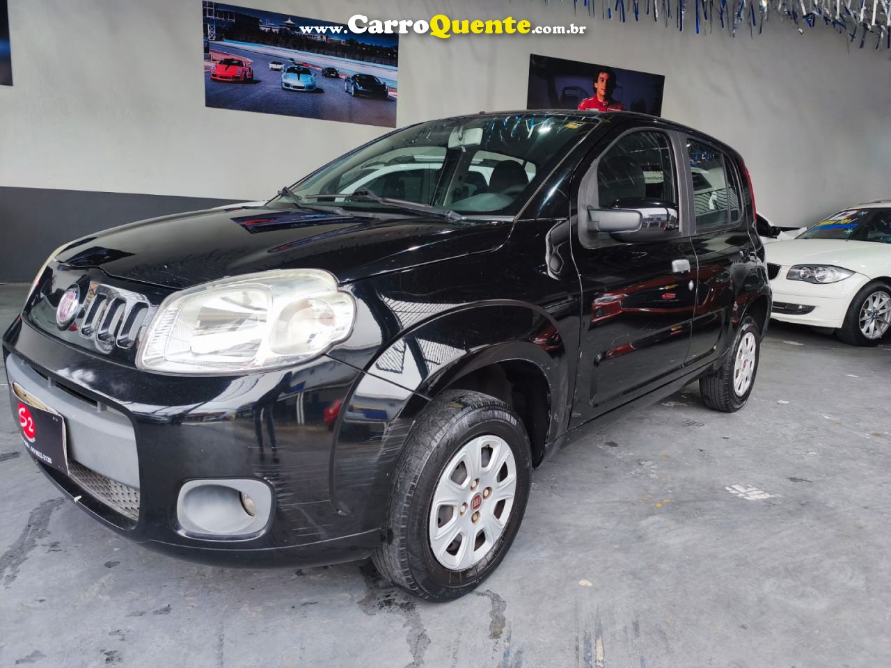 FIAT   UNO VIVACE CELEB. 1.0 EVO F.FLEX 8V 5P   PRETO 2012 1.0 GASOLINA - Loja