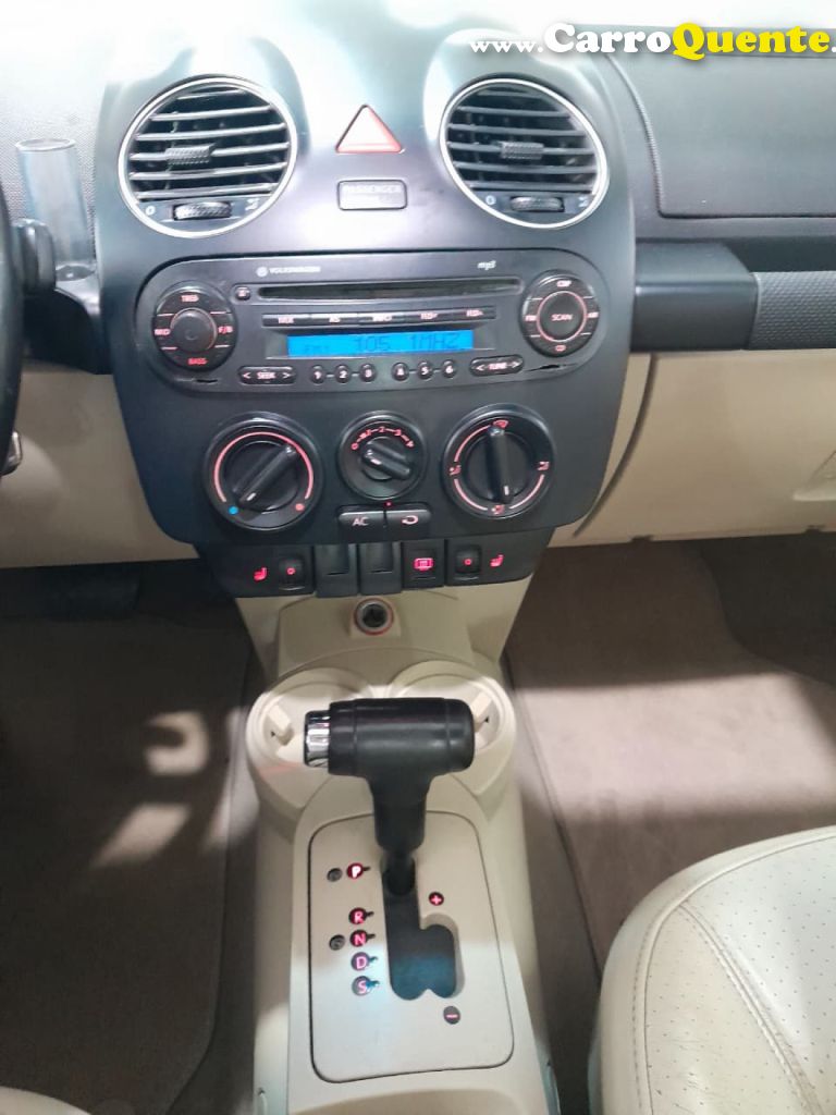 VOLKSWAGEN   NEW BEETLE 2.0 MI MEC.AUT.   PRETO 2010 2.0 GASOLINA - Loja