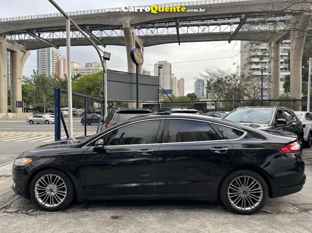 FORD   FUSION TITANIUM 2.0 GTDI ECO. AWD AUT.   PRETO 2013 2.0 GASOLINA - Loja