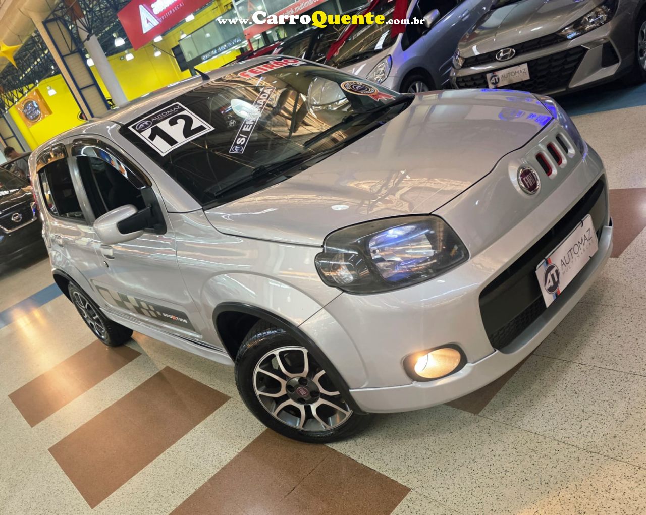 FIAT UNO 1.4 EVO SPORTING 8V 2012 - Loja