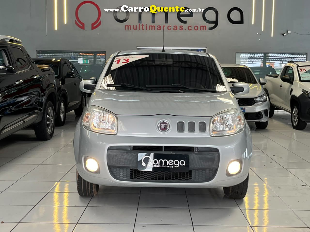 FIAT   UNO VIVACE CELEB. 1.0 EVO F.FLEX 8V 5P   PRATA 2013 1.0 GASOLINA - Loja