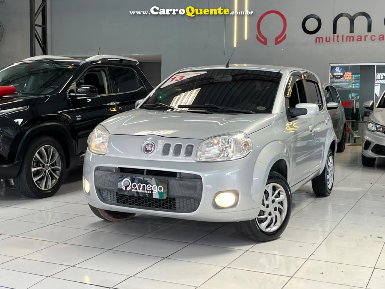 FIAT   UNO VIVACE CELEB. 1.0 EVO F.FLEX 8V 5P   PRATA 2013 1.0 GASOLINA - Loja