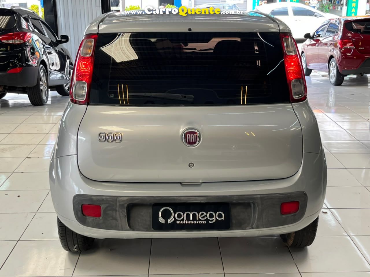FIAT   UNO VIVACE CELEB. 1.0 EVO F.FLEX 8V 5P   PRATA 2013 1.0 GASOLINA - Loja