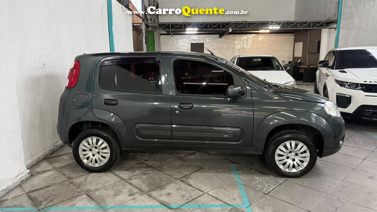 FIAT   UNO VIVACE CELEB. 1.0 EVO F.FLEX 8V 5P   CINZA 2011 1.0 GASOLINA - Loja