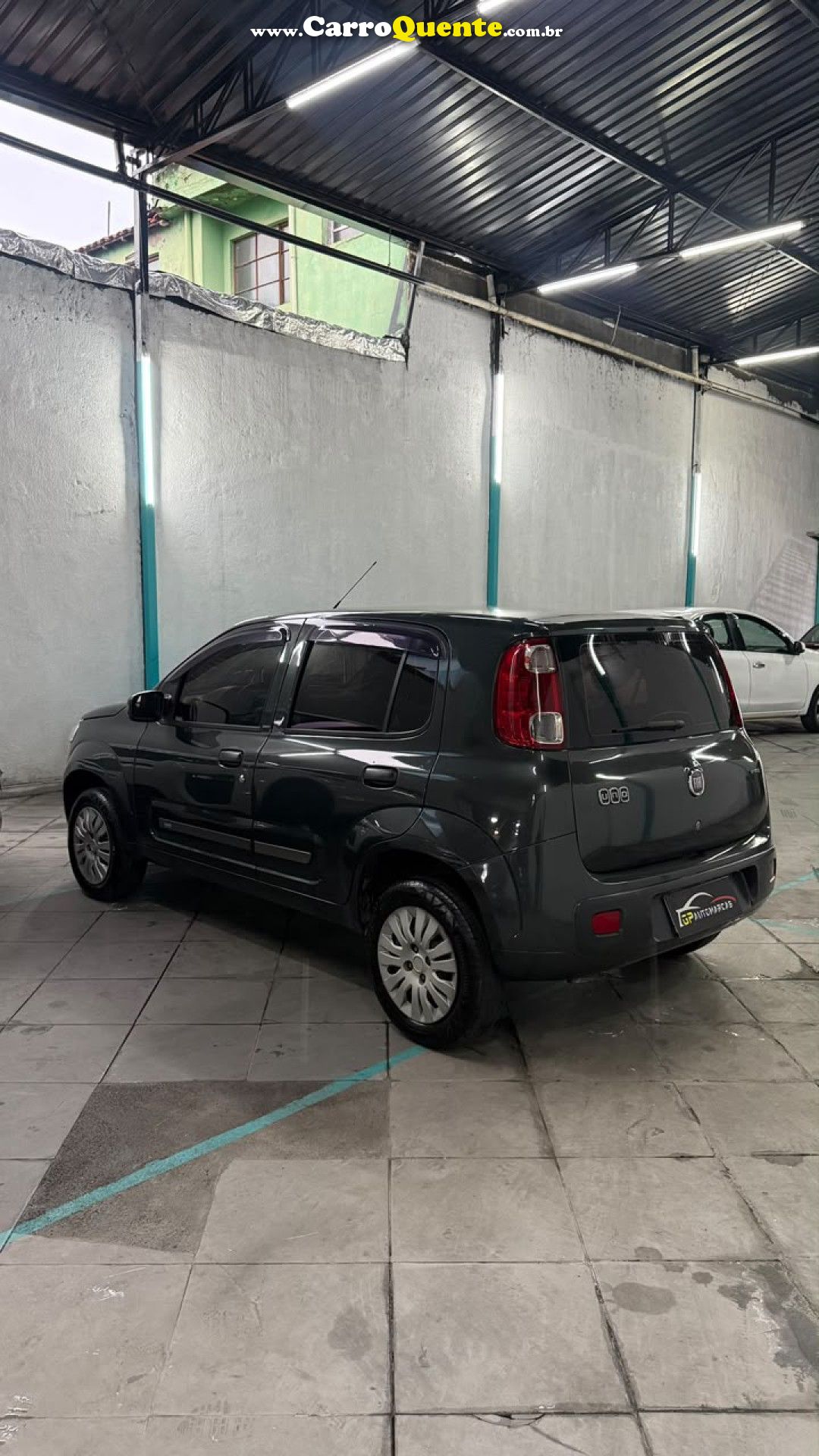 FIAT   UNO VIVACE CELEB. 1.0 EVO F.FLEX 8V 5P   CINZA 2011 1.0 GASOLINA - Loja