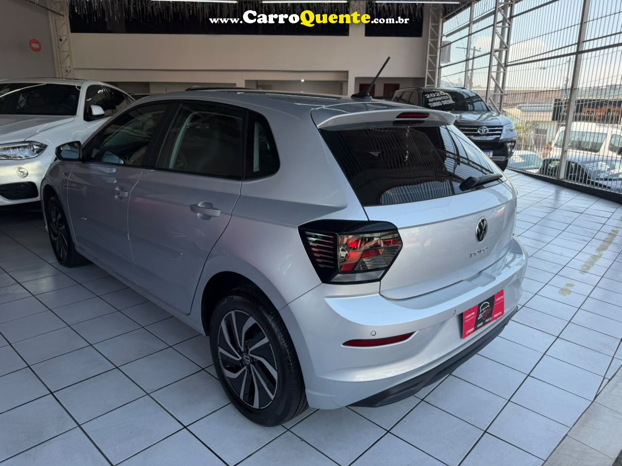 VOLKSWAGEN   POLO HIGHLINE 200 TSI 1.0 FLEX 12V AUT.   PRATA 2025 1.0 FLEX - Loja