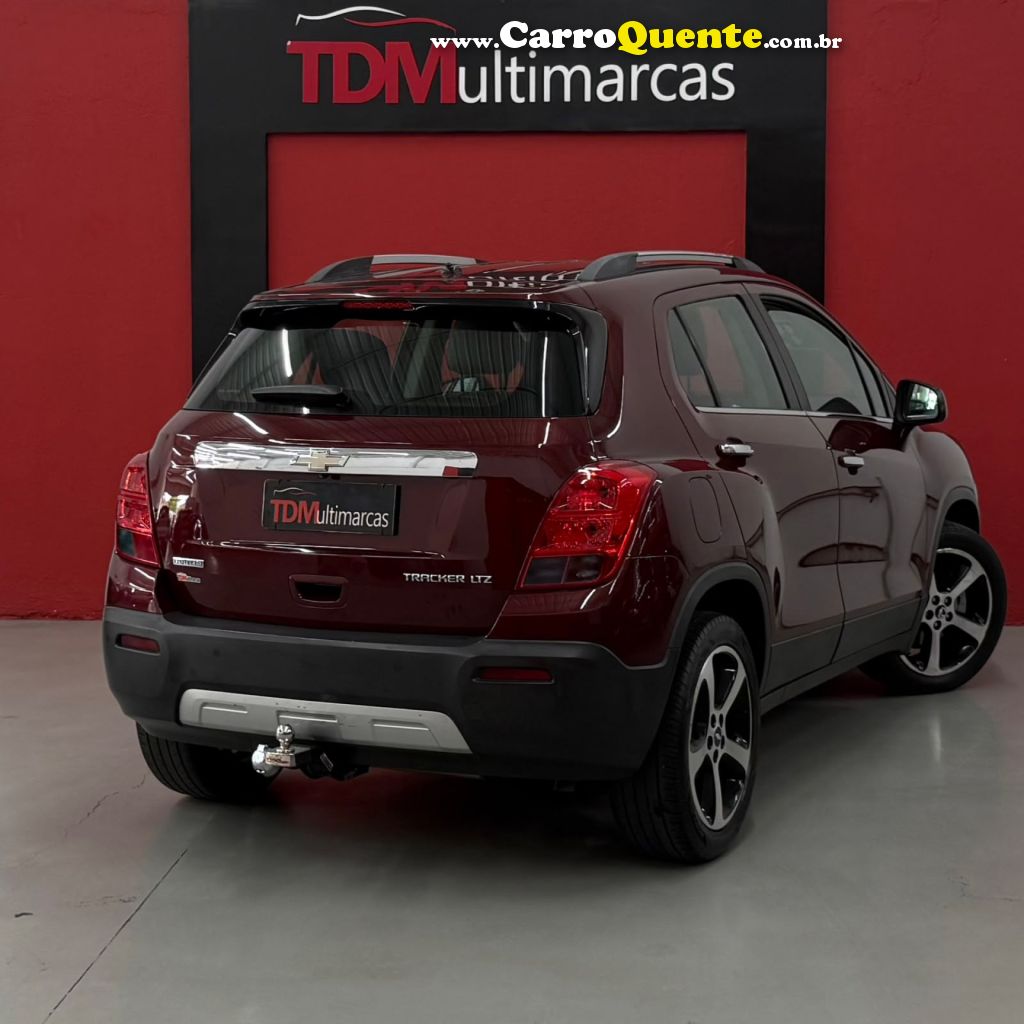 CHEVROLET   TRACKER LTZ 1.8 16V FLEX 4X2 AUT.   VERMELHO 2015 1.8 FLEX - Loja