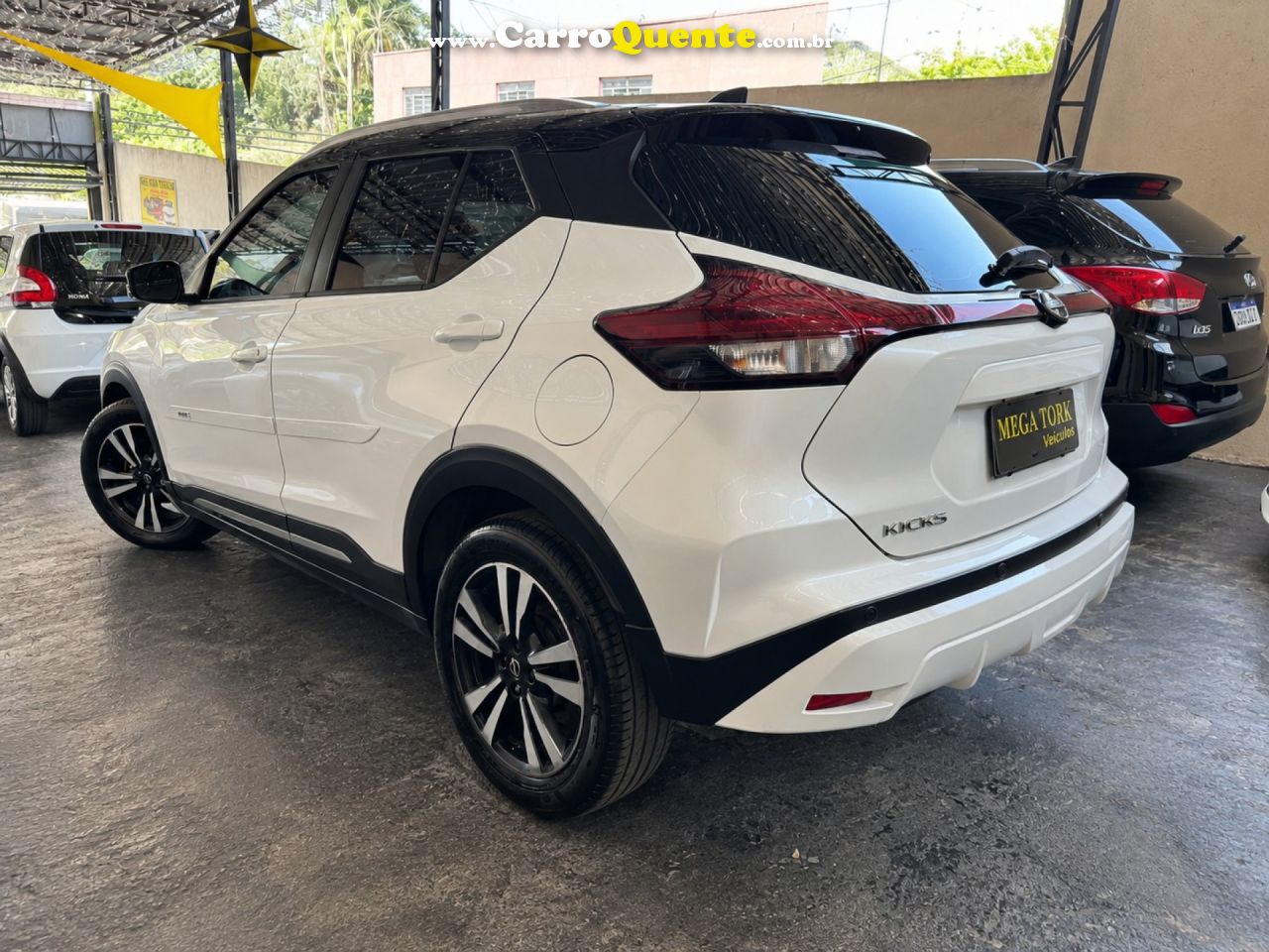 NISSAN   KICKS EXCLUSIVE 1.6 16V FLEX AUT.   BRANCO 2024 1.6 FLEX - Loja