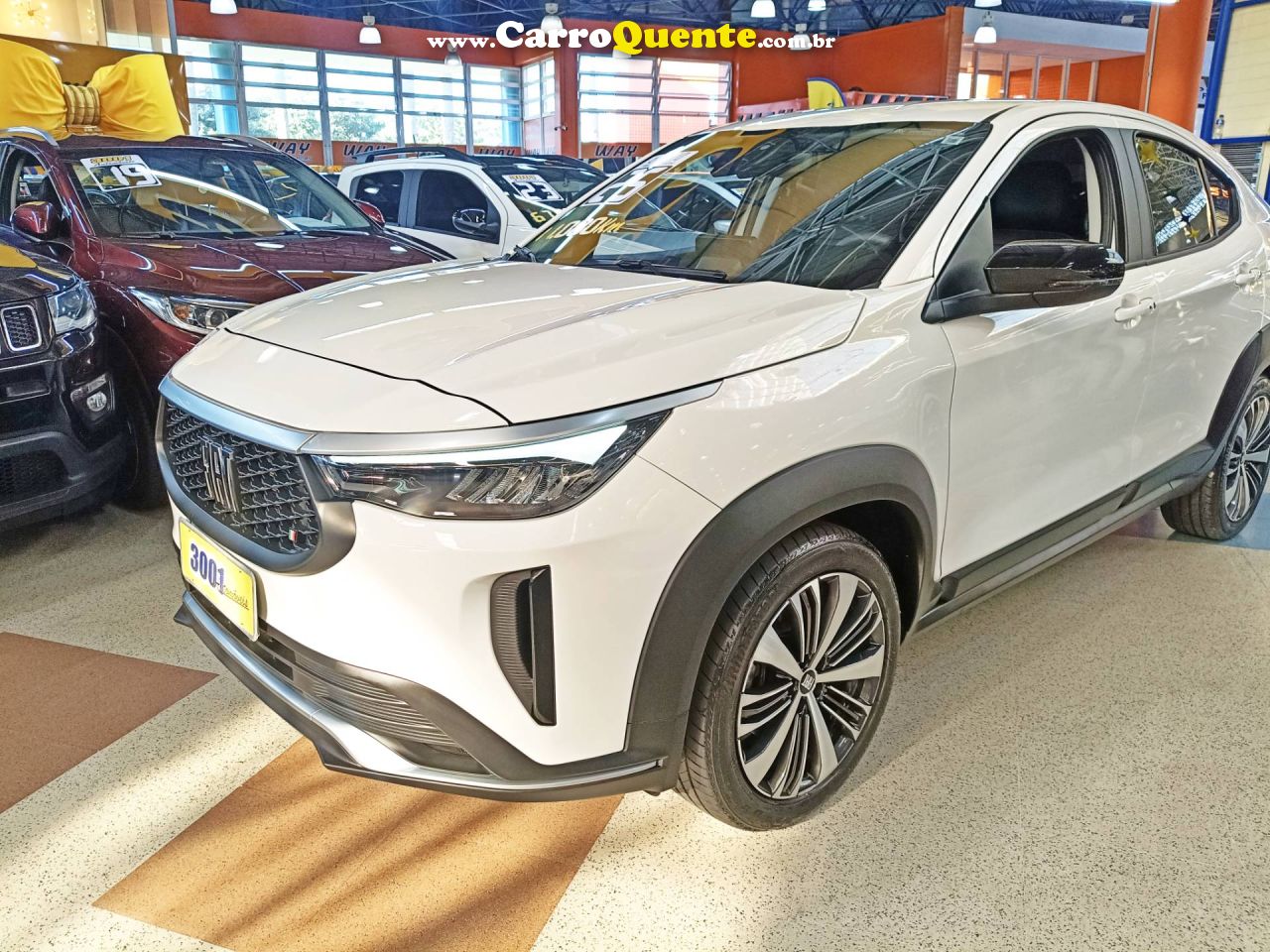 FIAT FASTBACK 1.0 TURBO 200 HYBRID AUDACE 2025 - Loja