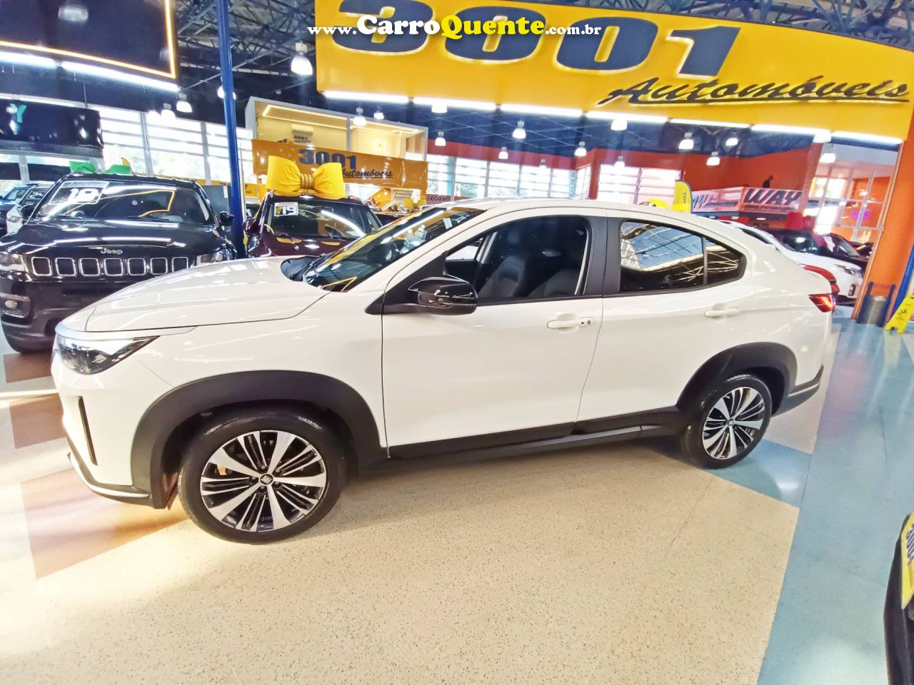 FIAT FASTBACK 1.0 TURBO 200 HYBRID AUDACE 2025 - Loja