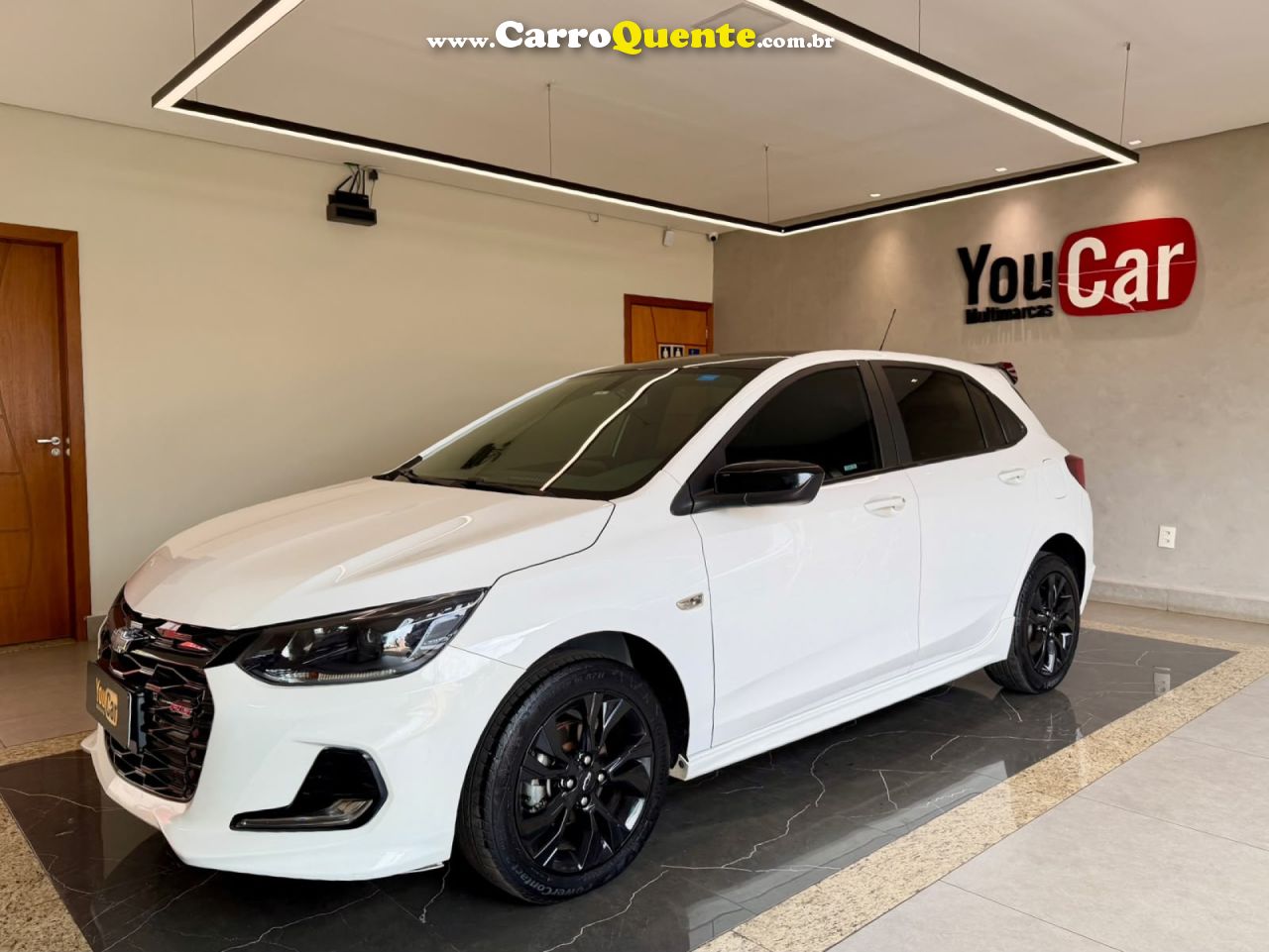 CHEVROLET   ONIX HATCH RS 1.0 TB 12V FLEX 5P AUT.   BRANCO 2024 1.0 FLEX - Loja