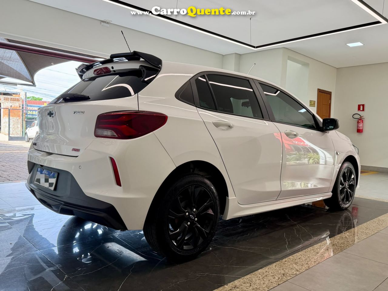 CHEVROLET   ONIX HATCH RS 1.0 TB 12V FLEX 5P AUT.   BRANCO 2024 1.0 FLEX - Loja