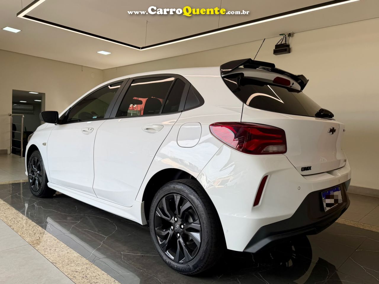 CHEVROLET   ONIX HATCH RS 1.0 TB 12V FLEX 5P AUT.   BRANCO 2024 1.0 FLEX - Loja