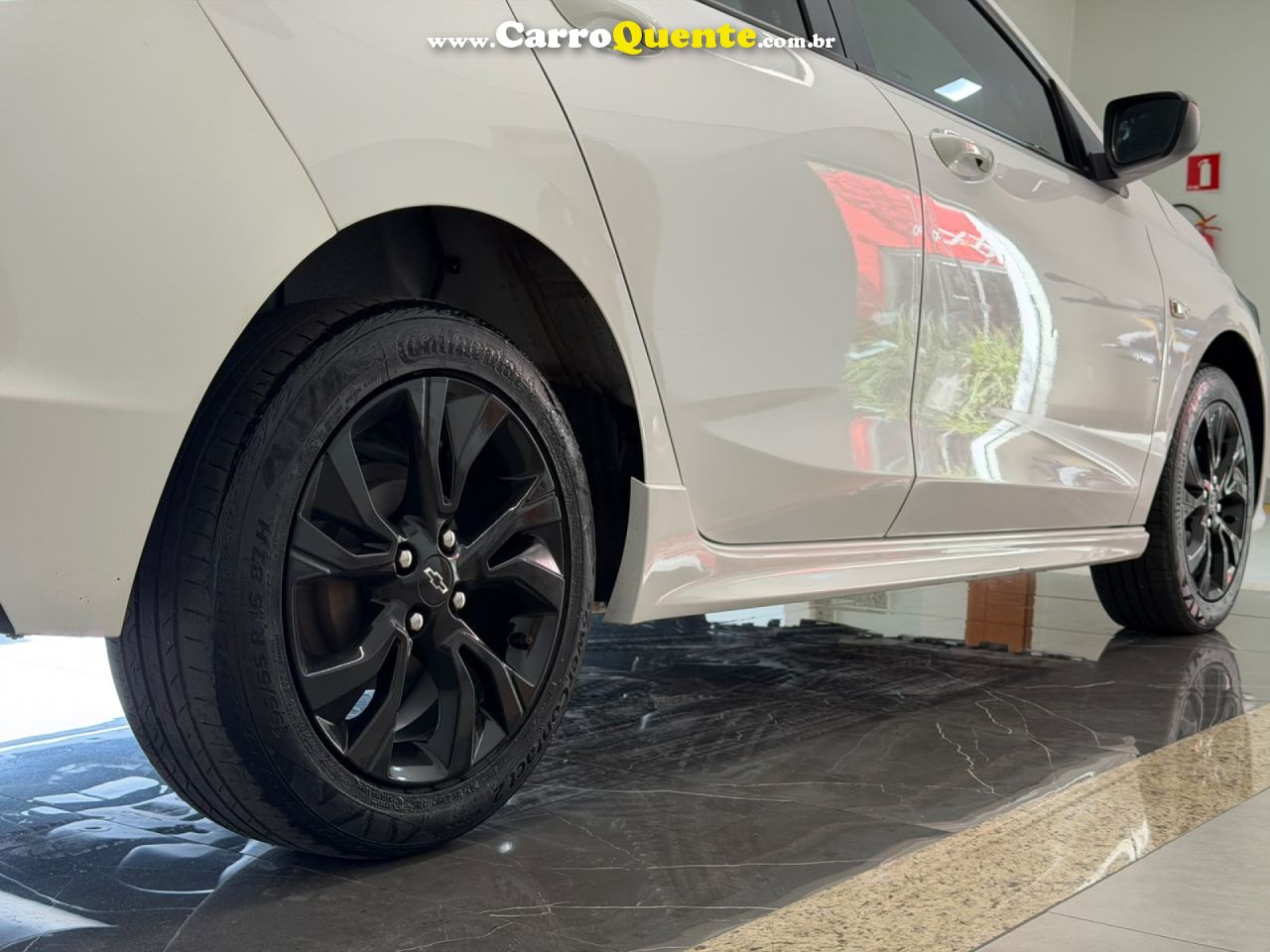 CHEVROLET   ONIX HATCH RS 1.0 TB 12V FLEX 5P AUT.   BRANCO 2024 1.0 FLEX - Loja