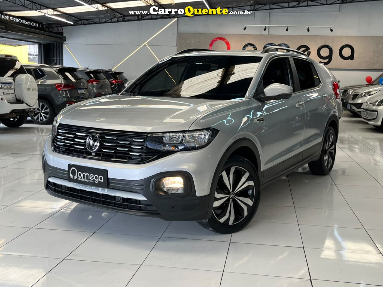 VOLKSWAGEN   T-CROSS COMFOR. 200 TSI 1.0 FLEX 5P AUT.   PRATA 2023 1.0 FLEX - Loja