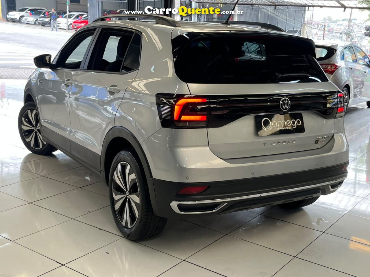 VOLKSWAGEN   T-CROSS COMFOR. 200 TSI 1.0 FLEX 5P AUT.   PRATA 2023 1.0 FLEX - Loja