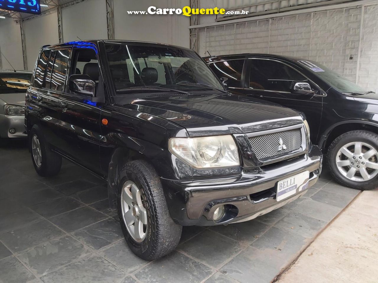 MITSUBISHI   PAJERO TR4 2.0 2.0 FLEX 16V 4X4 AUT.   PRETO 2006 2.0 GASOLINA - Loja